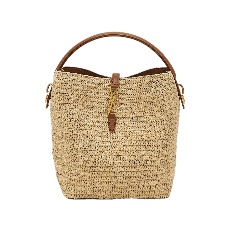 Saint Laurent natural raffia bucket bag with tan leather top handle, gold YSL charm, and crossbody strap — YSL raffia bag, designer straw bucket bag, summer luxury handbag