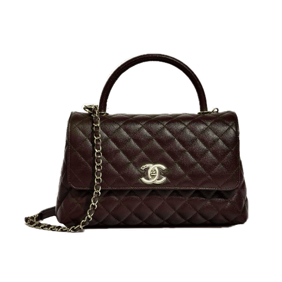 Chanel dark burgundy quilted caviar leather Coco Handle flap bag with top handle, CC turn-lock, and gold chain strap — Chanel Coco Handle bag, classic quilted designer handbag, luxury investment bag