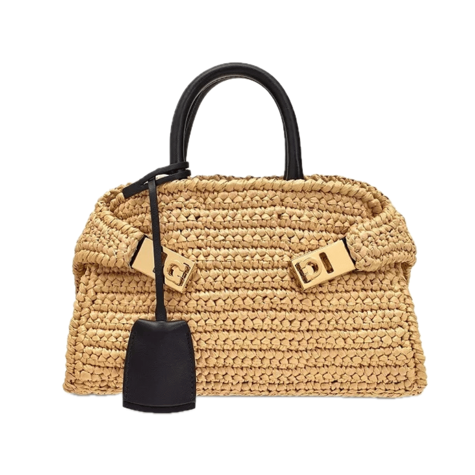 Salvatore Ferragamo woven raffia structured top-handle bag with black leather handles, gold turnlock hardware, and charm — Ferragamo raffia bag, designer summer handbag, luxury straw structured bag