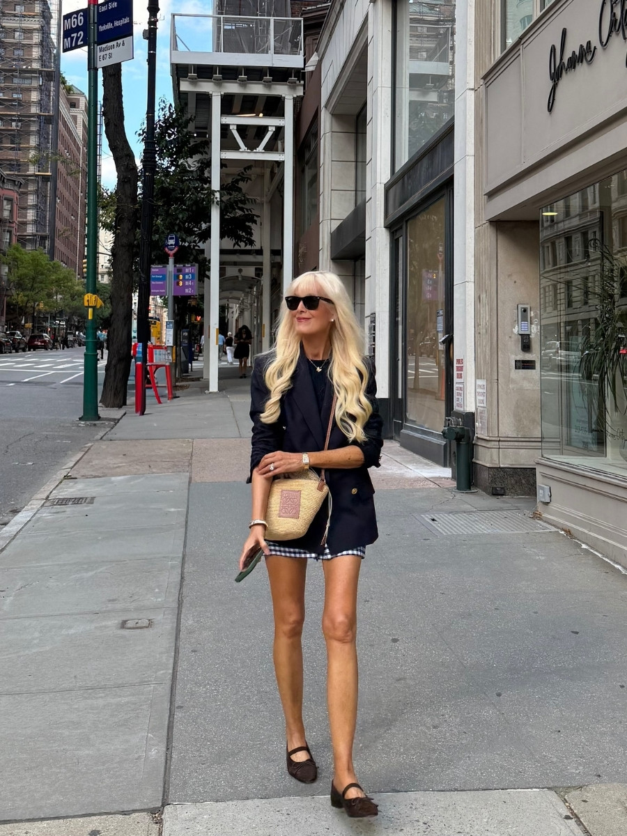 Mary wearing a navy Polo Ralph Lauren blazer, Veronica Beard gingham shorts and brown ballet flats on Madison Avenue in New York City.