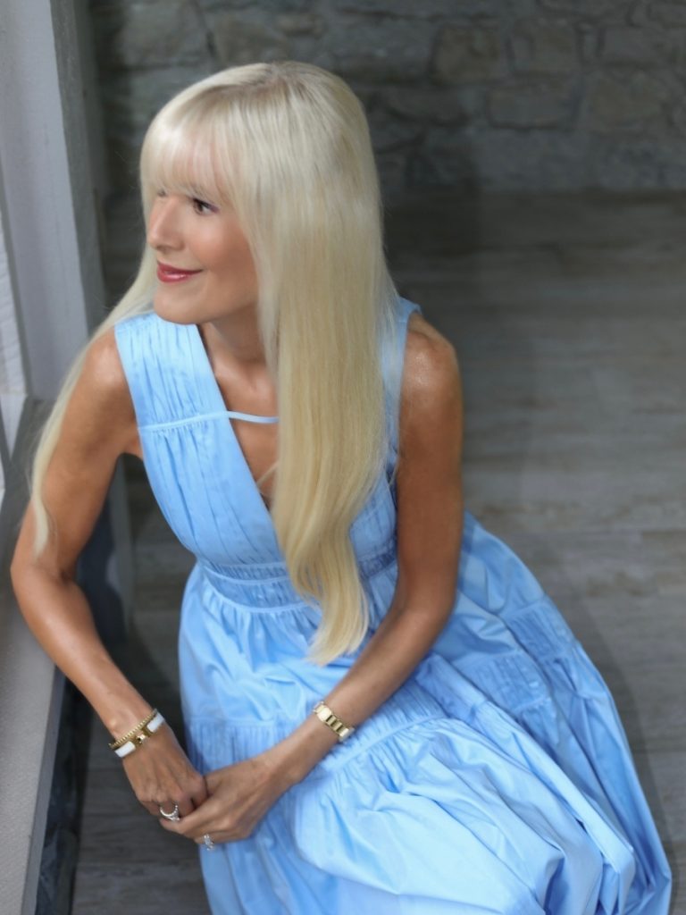 Mary wearing an Aje dress with Jack Rogers shoes, a Valentino bag and an Alice Walk wrap for an evening out in New York.